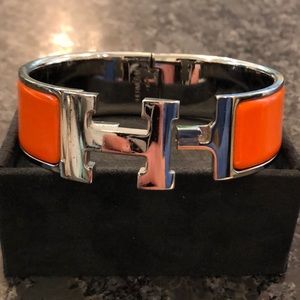 Hermès clic clac H orange enamel sterling silver